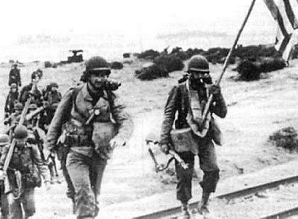 1ere div d infanterie us porend pied sur la plage de saint leu